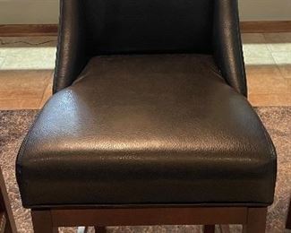 Walter E. Smithe Swivel Bar Stools (4)
May be sold separately.