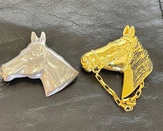 Silver horse pins.  https://www.liveauctioneers.com/catalog/274244