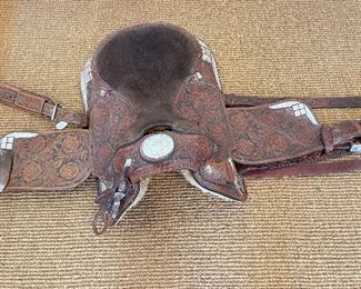 Saddle with silver. https://www.liveauctioneers.com/catalog/274191