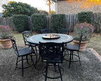 Large cast aluminum patio table with lazy Suzan and 6 chairs and cushions ( not pictured)