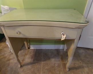 Curved writing desk with glass top