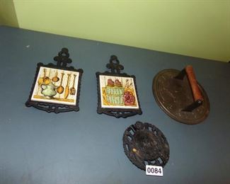 Vtg cast iron trivets