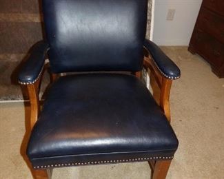Two blue leather armchairs