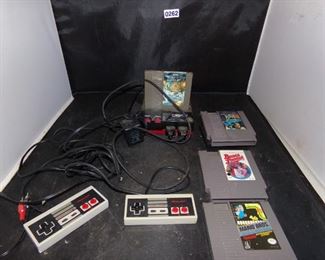 Entertainment center w/Nintendo controllers and some games untested