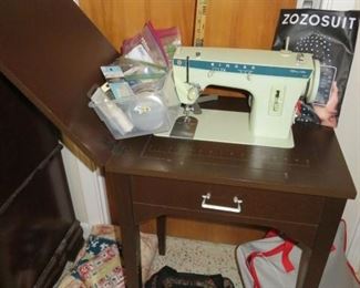 Singer Sewing Machine & Cabinet