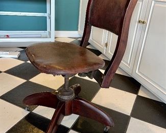 Rolling Leather Chair- $75