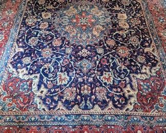 Gorgeous, hand-woven Persian Isfahan rug, 100% wool face, measures 13' 8" x 9' 11".