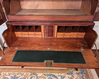 Here you can see the tooled leather writing surface of the drop-front secretary. I love the secondary woods and figuring of the veneer.