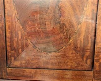 Close-up of the inlaid wood and fabby patina.