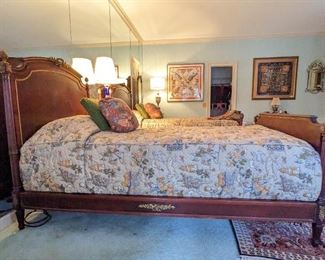 This is a side view of one of the pair of antique twin beds, showing the bronze mount detail.