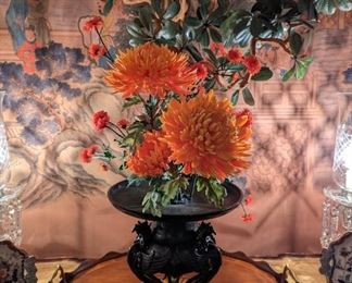 Circa 1954 floral arrangement in solid bronze “Ikebana” vessel, on antique inlaid mahogany serving tray, w/brass handles.