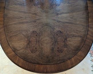 Beautiful banded burl wood Karges French provincial dining table, with pencil inlay details.