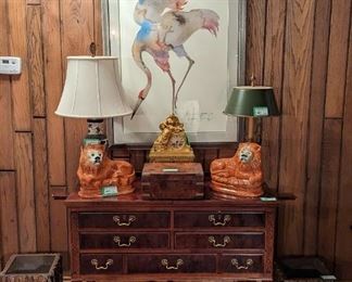 Gorgeous "Aston Court" 7-drawer Chinese Chippendale flame mahogany convertible-top server, w/lower shelf, vintage Asian earthenware lamp, vintage tole table lamp, pair of vintage English porcelain lions, antique burl wood English writing desk, pair of square, hand-made poplar bark & steel leaves planters, and the other of the pair of nicely framed/matted crane prints, by listed artist Carol Griggs - this one entitled "Crane Song".