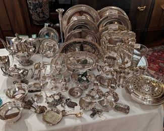 Large collection of sterling silver serving pieces and hollowware.