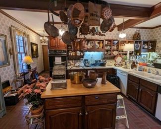 Kitchen full o' goodies, even a vintage National cash register, to check you out.