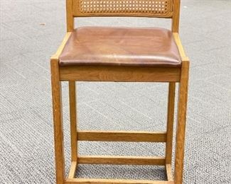 Pair of 1970s Whitaker Furniture Oak Counter Stools with Cane Backs and Leatherette Seats. Each Measures 35" H x 17" W x 19" D with 26" Seat Height. Photo 1 of 4. 