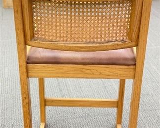 Pair of 1970s Whitaker Furniture Oak Counter Stools with Cane Backs and Leatherette Seats. Each Measures 35" H x 17" W x 19" D with 26" Seat Height. Photo 3 of 4. 