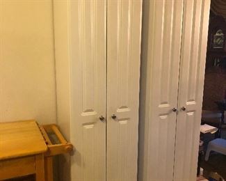 2 of 3 White Storage Cabinets each measure 70inH x 18inW x 15.25inD)