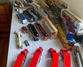 Die-cast semi trucks (many numbered)