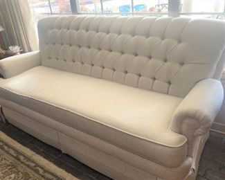 White tufted back sofa