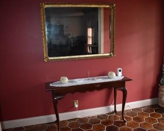 Beautiful Queen Anne Entryway Table with Gorgeous large Gold Gild Wall Mirror and Antique Porcelain Umbrella Stand in the corner