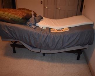 Like new Completely Adjustable Motorized Single Bed