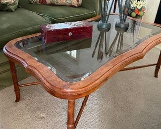 Glass topped coffee table