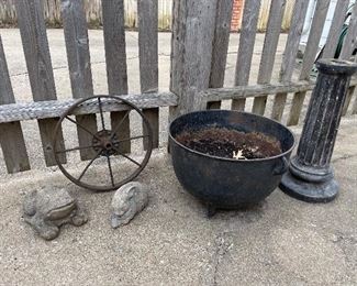 Some sweet antiques (cast iron cauldron, wagon wheel)