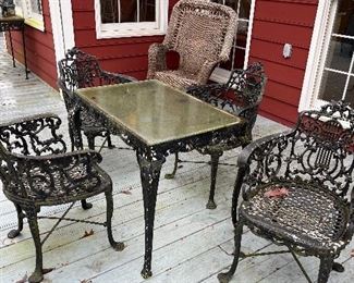 Cast Iron table and four chairs
