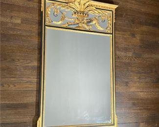 BLACK & GILT FEDERAL MIRROR  |                                   Over mantel wall mirror with black and gold decoration crested top with scroll and leaf device carved in high relief with quiver of arrows and band of stars - w. 35 x h. 55 in.