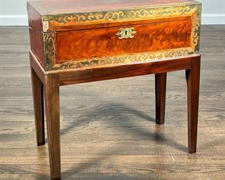 ANTIQUE BURL WOOD WRITING BOX  |                                    With decorative brass binding, with red velvet-lined writing surface, on a conforming stand - l. 20 x w. 10 x h. 21 in.
