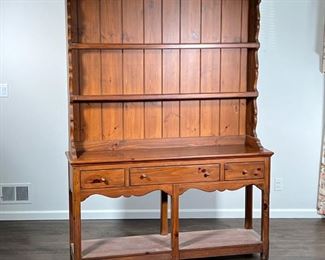 ETHAN ALLEN HUTCH   |                                                                     Having two plate shelves over an open shelf with three drawers with sculpted apron - l. 60 x w. 16 x h. 82 in.