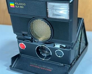 POLAROID SLR680  |   Polaroid SLR 680 autofocus / auto strobe Land Camera with original box and manual