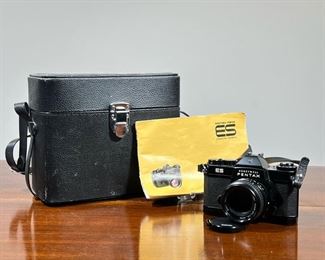 HONEYWELL PENTAX ES CAMERA  |   Vintage Honeywell Pentax ES 35mm analog film camera with SMC Takumar 1.8 55mm lens with original manual and leather carrying case, also includes Soligor 19A flash - l. 10 x w. 5 x h. 8 in. (case measurement)