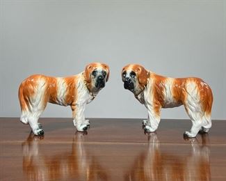 (2pc) PAIR PORCLEAIN STAFFORDSHIRE DOGS  |  Pair of large 19th century English porcelain Staffordshire / St. Bernard Dog sculptures with inserted glass eyes and gilt collars. Beautifully hand painted and glazed - l. 13 x h. 9 in. (each)
