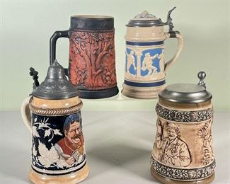 (4pc) SMALL METTLACH STEINS  |  Four Mettlach steins from Germany; three lidded and one with no lid; all marked on bottom - h. 8 x dia. 4 in. (largest)

