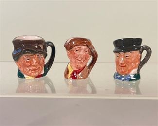 (3pc) MINIATURE TOBY JUGS  |  Three very small Toby jugs by Royal Doulton; each depicts a man with hat, marked on bottoms - l. 1.5 x w. 1 x h. 