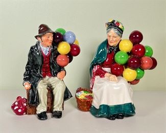 (2pc) ROYAL DOULTON BALLOON COUPLE  |  Royal Doulton porcelain figurines, one called "The Balloon Man" Ra. No. 838448 H.N. 1954; the other called "The Old Balloon Seller" H.N. 1315 - l. 6 x w. 4 x h. 7 in. (man)