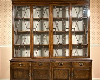 DOUBLE BOOKCASE CABINET  |                                                          Four paneled glass doors over four drawers and four lower cabinet doors, brass hardware - l. 76.5 x w. 17.5 x h. 82.5 in.
