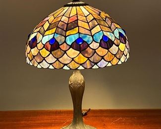 BLUE STAINED GLASS TABLE LAMP  |  Peacock feather form stained glass shade on a pressed metal base - h. 23 x dia. 16 in. (overall with shade)