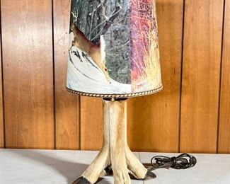 DEER FOOT LAMP  |  Four legged lamp made of four deer feet with lampshade featuring photos of deer - h. 23 x dia. 11 in.

