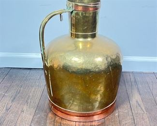 LARGE BRASS JUG  |  A very large brass jug with handle, with contrasting copper rims - h. 18 x dia. 12 in.
