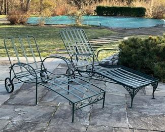 (2pc) GREEN POWDER COATED LOUNGE CHAIRS  |  Patio furniture lounge chairs, two very similar, but not exactly matching; both green with viney decorations and back wheels - l. 68 x w. 29 x h. 36 in. (approximately, with backrest up)