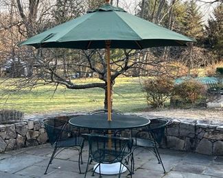 (6pc) WOODARD STYLE PATIO SET  |  Green outdoor furniture suite, including four arm chairs, a round table, and a green umbrella with a weighted stand; powder coated - h. 30 x dia. 47 in. (Table)
