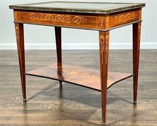 INLAID ANTIQUE DISPLAY TABLE  |  Inlaid with contrasting woods, having a hinged glass lid opening a green-lined display compartment over a lower shelf with intricate inlay decoration, on square tapering legs - l. 32 x w. 20.5 x h. 29 in.
