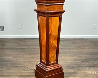 PANELED WOOD DISPLAY PEDESTAL  |  Contrasting panels and tapering form decorated with various patterns of molding - l. 14 x w. 14 x h. 50 in.
