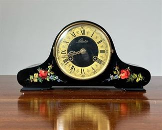 SCHLENKER MANTEL CLOCK  |  Erich Schlenker, Germany, black lacquered case painted with flowers - l. 12.5 x w. 4.5 x h. 7 in.

