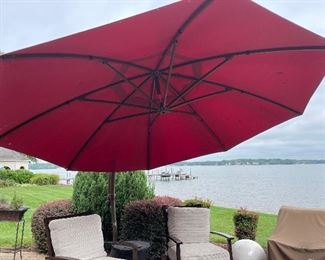 outdoor patio umbrella- cemented in 1 of 2
