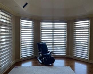 Remote controlled window shades by Hunter Douglas (bedroom)