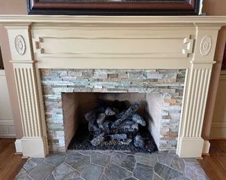 Mantel and gas logs by Hearth & Home